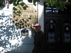 Famous Belgrade cafe Dva jelena on Skadarlija with real deer statue John Deer in front