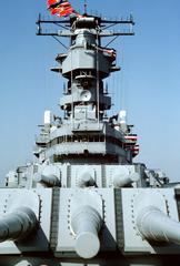 Two Mark 7 16-inch-50-caliber gun turrets and superstructure aboard battleship USS Wisconsin during decommissioning ceremony
