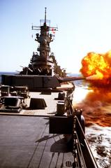 Mark 7 16-inch-50-caliber battleship gun firing on USS Wisconsin during Persian Gulf desert shield operation