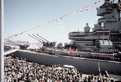 Guests observing Mark 7 16-inch-50-caliber guns being traversed and elevated on battleship USS Wisconsin BB-64