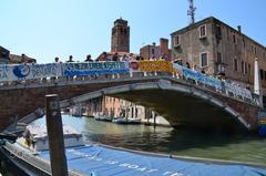 Venice cityscape with historical buildings under blue sky