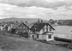 Aerial view of old city center with villas and modest cathedral in Reykjavik, Iceland, 1934