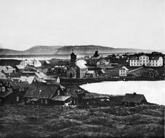 Historic view of Reykjavík in the 1860s showing the governor's house, cathedral, college, Reykjavík mill, and the Pond (Tjörnin)