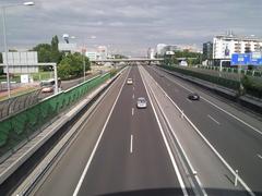 Street view of Einsteinova street in Bratislava with residential buildings and trees