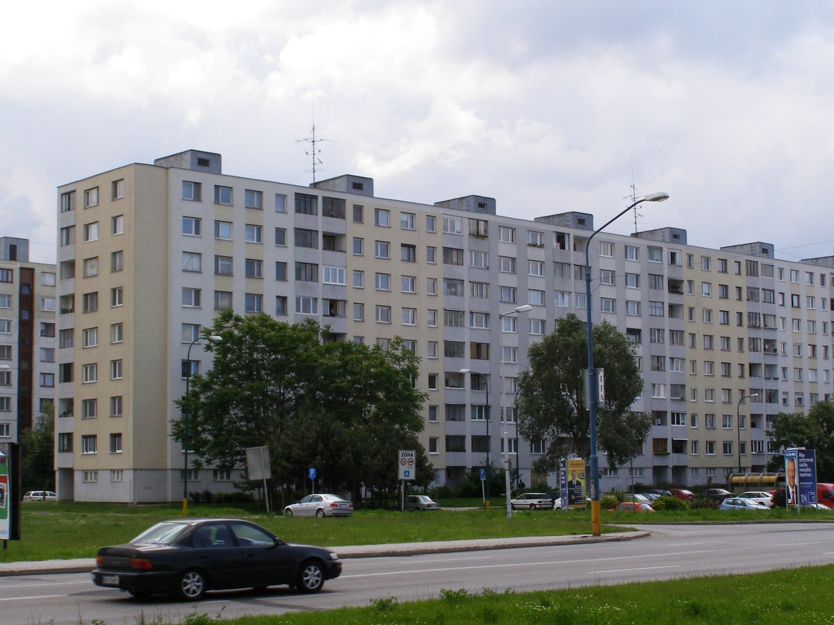 Jiráskova street in Petržalka district of Bratislava with residential buildings and greenery