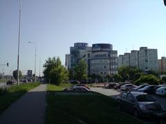 Panónska business district skyline with modern high-rise buildings and clear blue sky