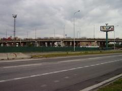 View of Panónska cesta street in Bratislava with buildings and clear sky