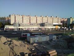 IDO metallurgical project site with large industrial structures and containers