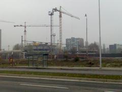 Construction site in Bratislava showing cranes and scaffolding