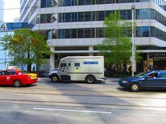 Brinks armoured car parked on Dundas street near Eaton's Centre