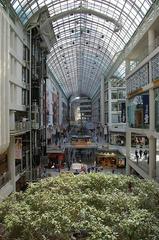 Toronto Eaton Centre interior with shoppers and vibrant lights