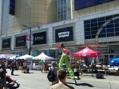 Buskers performing on stilts at Buskerfest 2014 outdoor festival