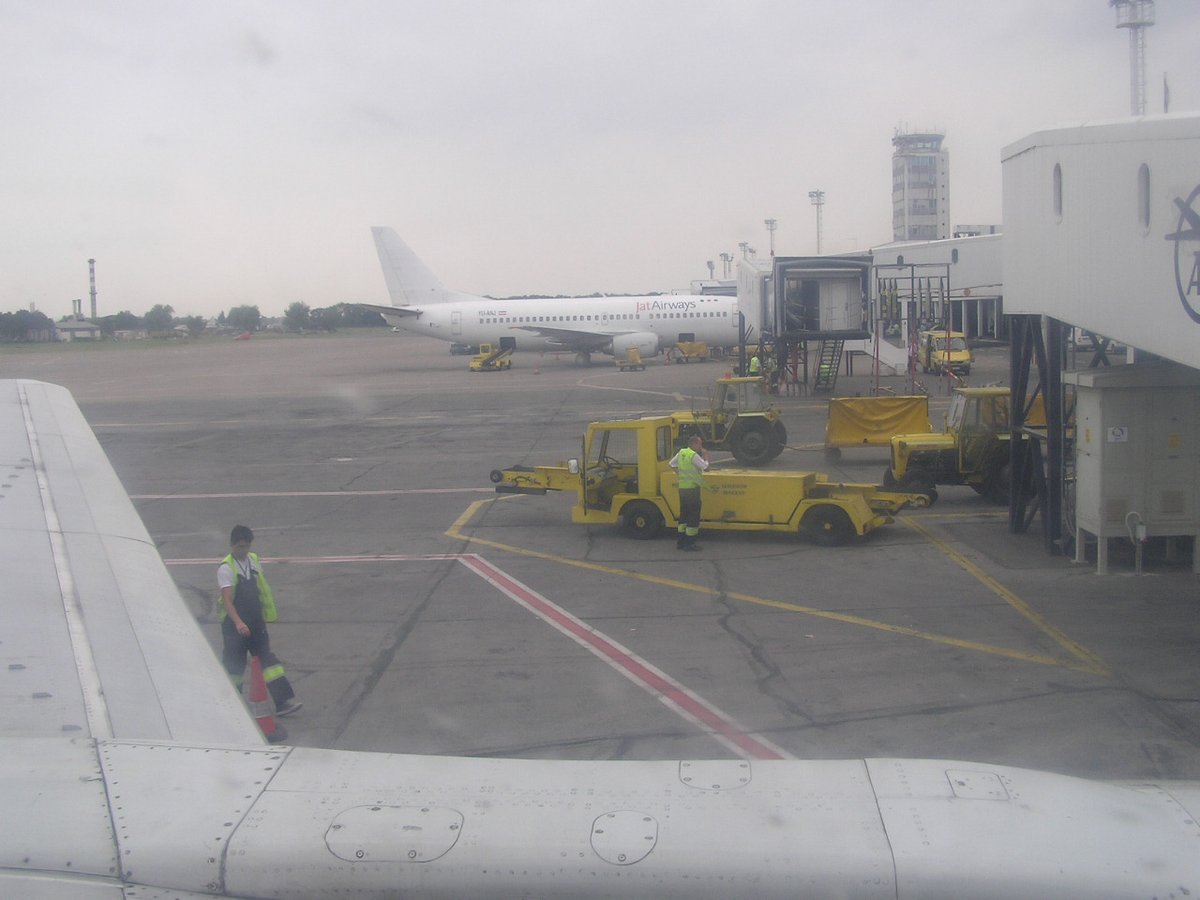 View from a Jat Airways airplane window overlooking Belgrade Nikola Tesla Airport