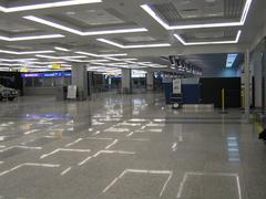 Check-in area at Belgrade Airport Terminal 2 with counters and passengers