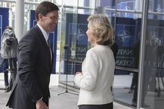 Acting U.S. Secretary of Defense Mark T. Esper arriving at NATO headquarters greeted by Ambassador Kay Bailey Hutchison