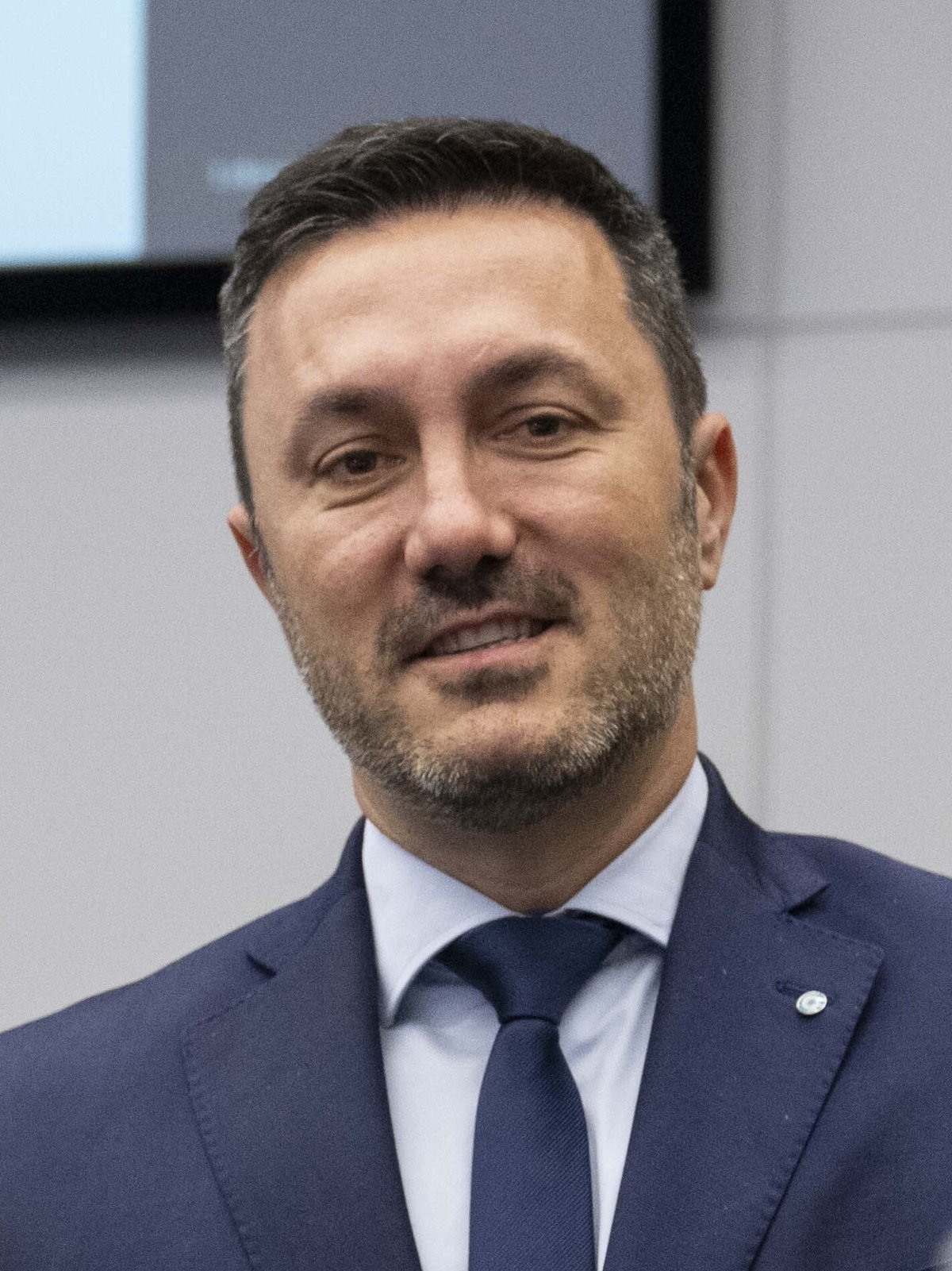 Secretary of Defense Lloyd J. Austin III posing with Argentina Minister of Defense Luis Petri at NATO Headquarters after 23rd Ukraine Defense Contact Group meeting