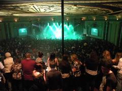 Inside the rapids theatre during Deftones concert with crowd and stage lighting