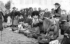 Women fishermen selling fresh catch at Port-Louis market in 1920