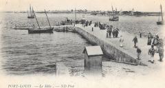 Historic view of Port-Louis pier with boat arriving from Lorient around 1900