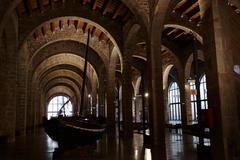 Exhibit at Museu Maritim de Barcelona showcasing maritime artifacts and models