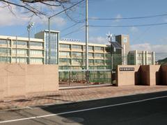 Teikyo Asaka High School building with signage in Japanese and English