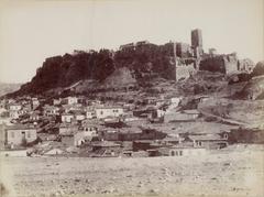 Northwest side of the Acropolis in Athens with surrounding ancient ruins and buildings