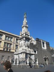 Guglia dell'Immacolata monument in Naples with blue sky in background