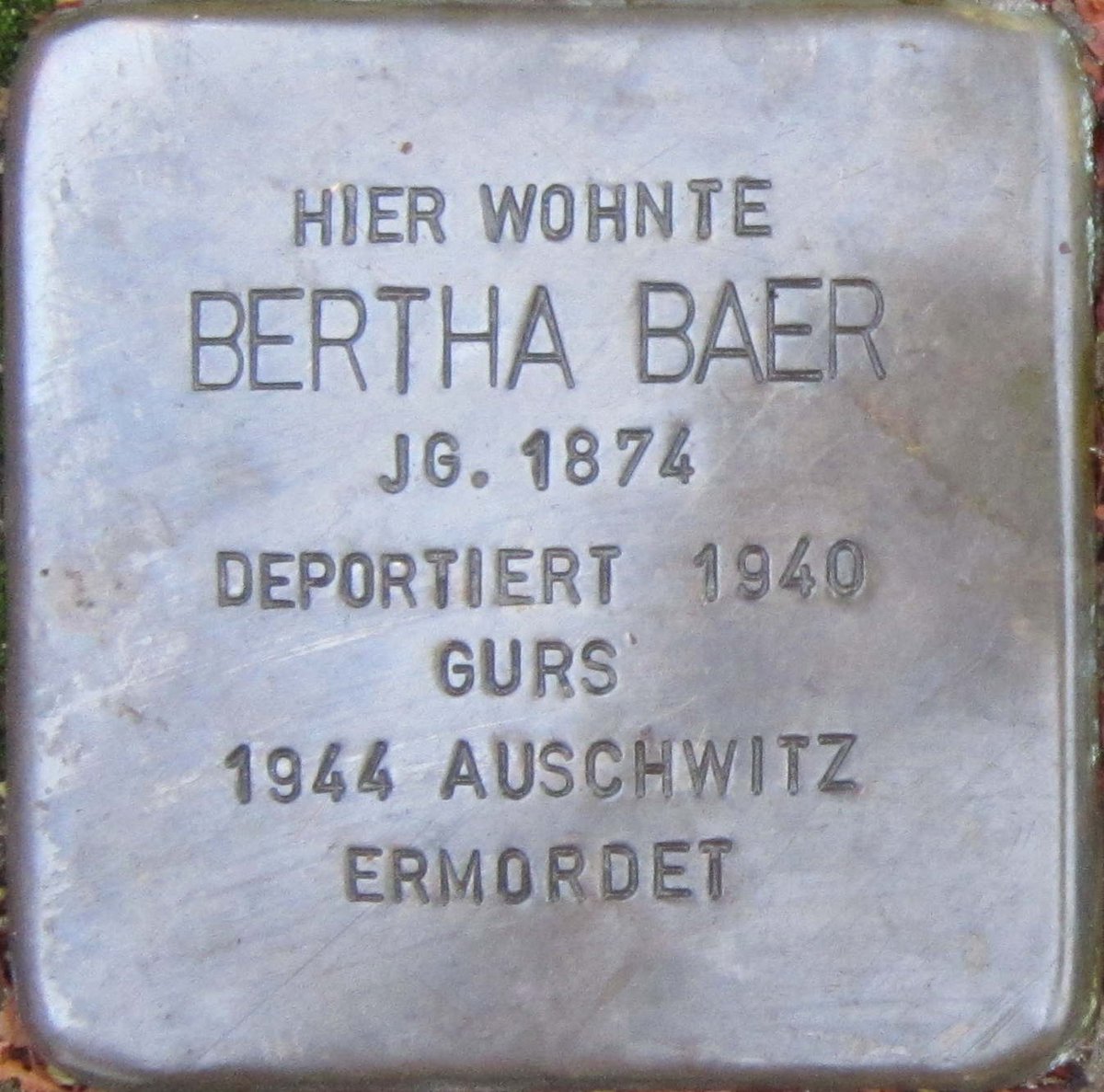Stolperstein dedicated to Bertha Baer in Karlsruhe, Germany on a cobblestone sidewalk