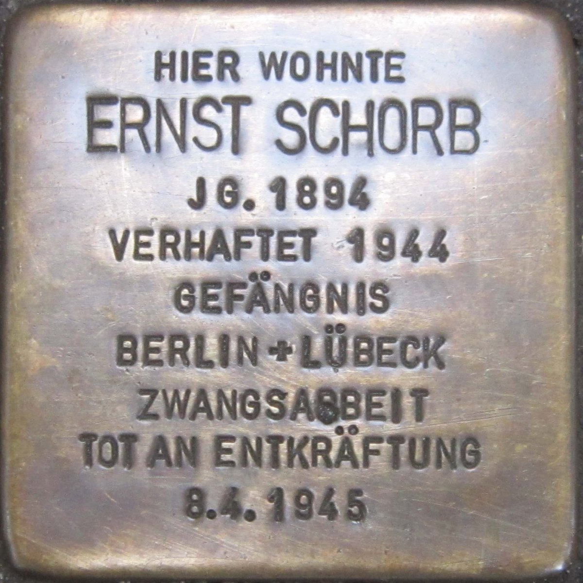 Stolperstein dedication plaque for Ernst Schorb in Karlsruhe Germany on pavement