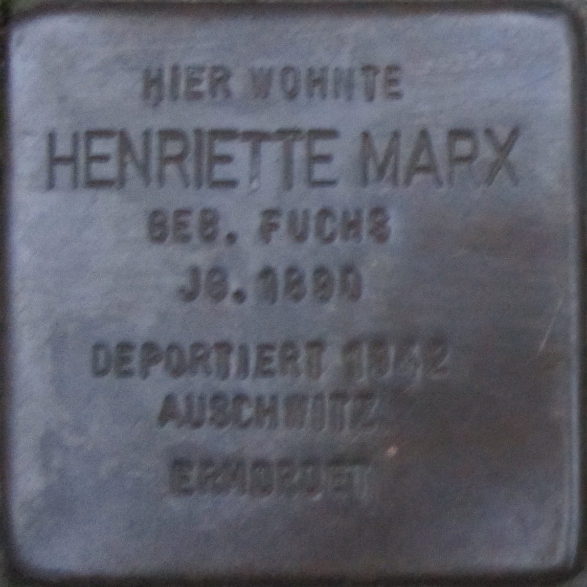 Stolperstein dedicated to Henriette Marx in Karlsruhe, Germany on pavement