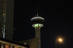 Tall lighted tower at night in San Antonio, Texas