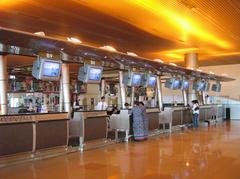 Kuching airport check-in counters with passengers and staff