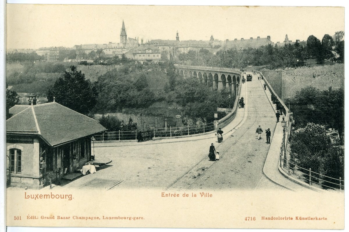 Historical entrance to the city of Luxemburg in 1903 showcasing old architecture and streets