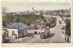 Vintage postcard showing the entrance of Luxembourg city with tram number 14