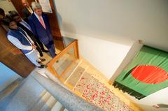 U.S. Secretary of State John Kerry looking at star memorial in Dhaka
