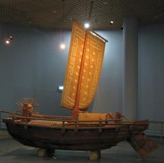 Model boat on blue display stand in Mokpo, Korea