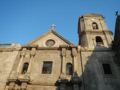 Interior of the Immaculate Conception Parish Church of San Agustin in Intramuros Manila with historical marker and adjacent landmarks