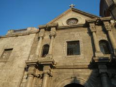 Interior of the Immaculate Conception Parish Church and San Agustin Church landmark in Intramuros Manila with historical markers and Santa Lucia Gate