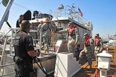 CSMR Soldiers boarding Los Angeles Port Police dive support ship at port