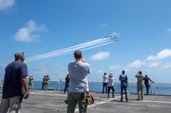 USNS Mercy hospital ship with U.S. Air Force Thunderbirds flying overhead during COVID-19 response off Pacific Ocean