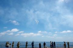 USNS Mercy hospital ship with U.S. Air Force Thunderbirds flying overhead during COVID-19 response mission