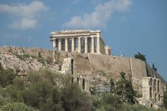 Cityscape of Athens in July 2018 with clear sky and city buildings