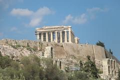 Panoramic view of Athens cityscape with Acropolis hill in the background during July 2018