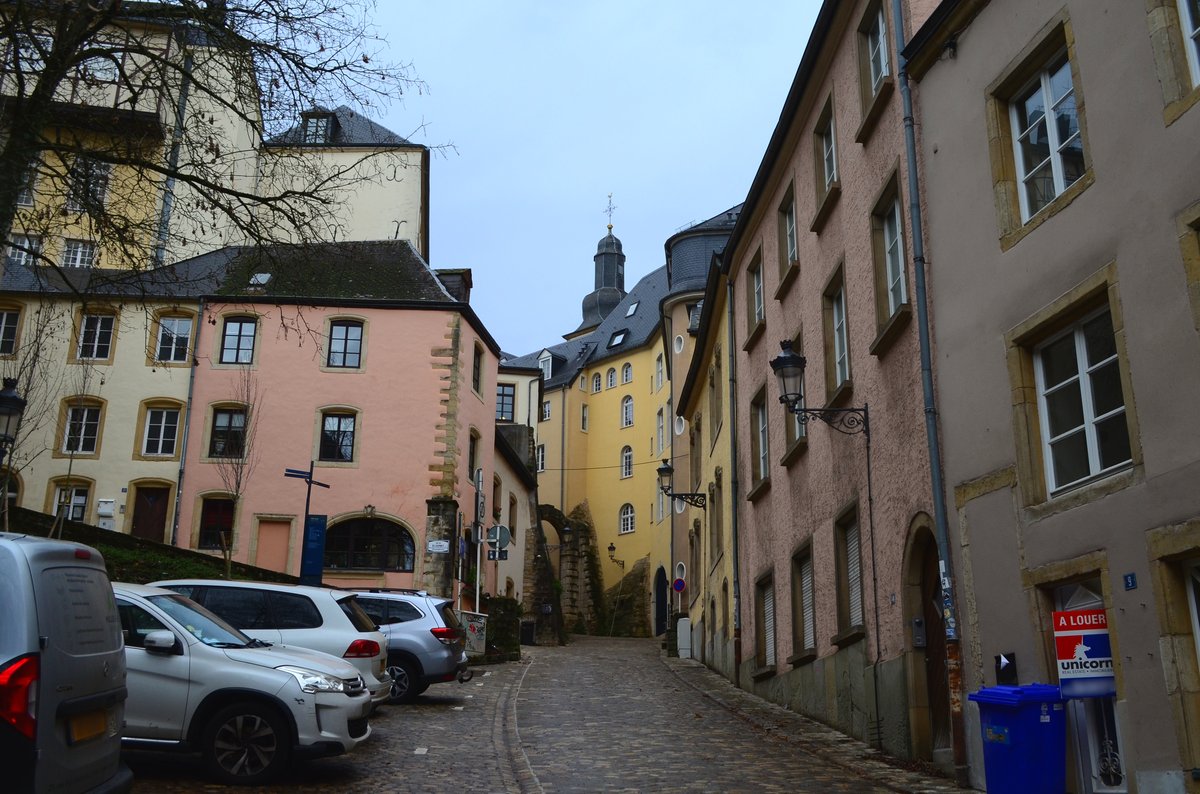 La rue Large (Breedewee) street view in Luxembourg with historic buildings and parked cars