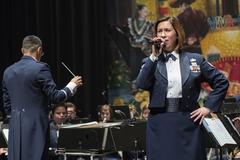 Staff Sgt. Rachel Wilson singing Fiesta classics during Fiesta in Blue concert at Trinity University