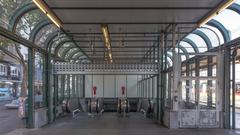 U1 underground station Schwedenplatz in Vienna with passengers and trains