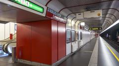 U-Bahn-Station Schwedenplatz in Vienna metro station interior with passengers on platform