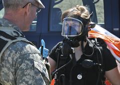 Sgt. Kelley Trebesch of the 82nd Civil Support Team in protective gear during a training exercise at a water reclamation plant in Sioux Falls