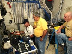 IT workers setting up networks in disaster recovery office in Sioux Falls