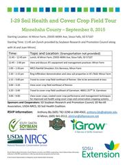 Participants at I-29 Soil Health and Cover Crops tours inspecting soil and cover crops in Minnehaha